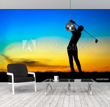 Picture of Silhouette golfer playing golf during beautiful sunset
